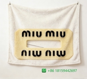 Miumiu Throw Blankets